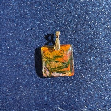 This one of a kind pretty pendant is handcrafted out of resin.
Earthy, orange, browns, and purples
Gold toned bail
Square
Lightweight
Approximate size including bail 1.25 inches