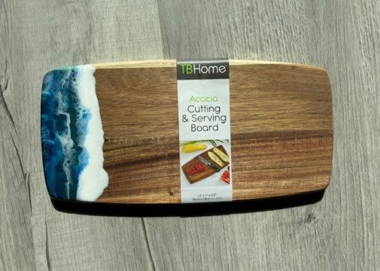 This is a small to medium sized cutting board that I did an ocean theme on one end. Beautiful Acacia Wood board.
There is a groove all the way around for juices and scraps.
Approximate size: 14 x 7 x 5/8 inches
Care: Do not place in the dishwasher. Wipe with a clean damp cloth or an alcohol wipe. Occasionally treat the wood with Olive Oil or Vegetable oil to protect it from drying out.
