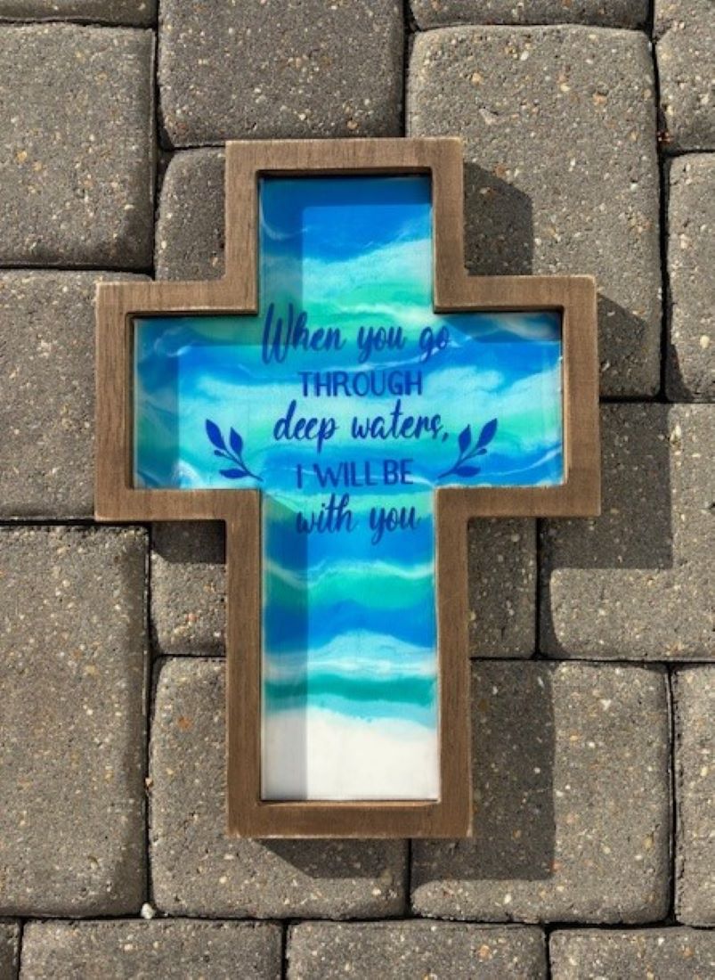 I created this beautiful wall cross with an ocean background. It reads, "When you go through deep waters, I will be with you". Another coat of clear resin to protect the cross. Wood trim for the "frame".
Saw tooth hanger on the back for hanging.
Approximate size: 14 x 10 x .75 inches