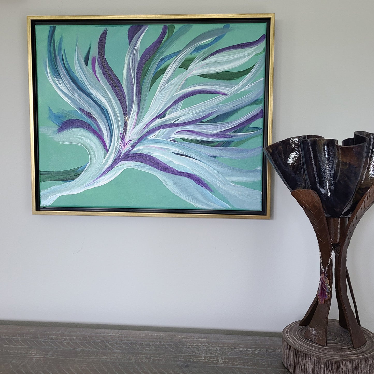 This original piece of art is inspired by Saatchi. The leaves seem to flow with a flourish! White, purples, greens and blues give a flowing movement to this work. Canvas is 16 x 20 inches. Framed and ready to hang. In a floating frame of black and gold. Overall approximate measurements: 17.5 x 21.5 x 1.25 inches I will include hanging wire and a "D: ring hanger for you to place where you want. If you would like it signed on the back, leave a message with the order.