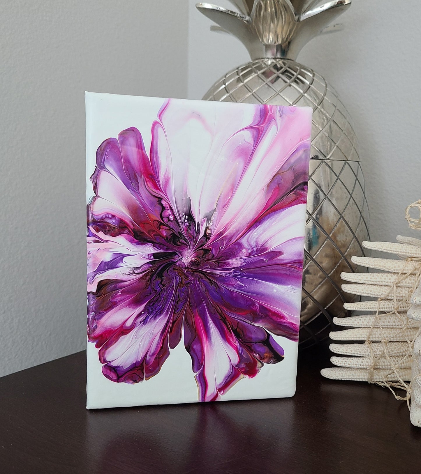 Frilly petals of magenta, pink, purple and gold meet in a swirly center. A lovely flower to brighten your room. Original artwork on canvas. Able to sit on a table or shelf or can be hung. Doesn't need a frame, but would also look beautiful framed. 5 x 7 x 1.5 inches Leave a message if you would like for me to sign the back.