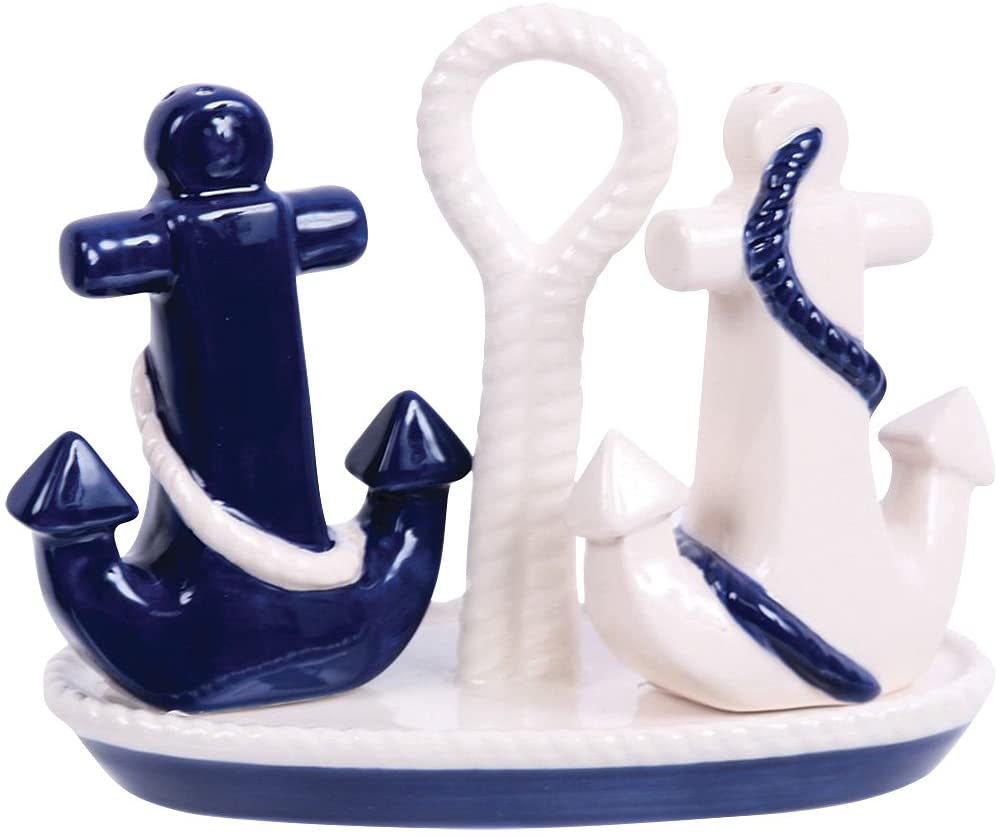 This is a beautiful navy and white salt and pepper set. Shakers are shaped like anchors and sit on an oval tray with a ceramic rope for a handle between them. All Ceramic