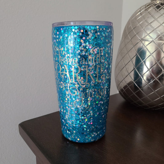 For those that sparkle...Leave a Little Sparkle Wherever You Go.  Pretty turquoise Stainless Steel tumbler with plastic lid, metal straw and straw cleaner.    The letters show up better in person than I could get them to photograph.  It's so shiny, I kept getting a glare on it.  Two coats of food safe resin on top of the letters, so they won't come off.  20 oz tumbler  Hand Wash Warm Water Only