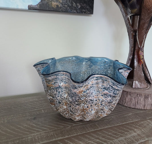 New from Cyan Design Striking Glass Vase called Meduse, is blue with light brown and white lace looking exterior. Inside is blue. Goes perfect in an ocean themed room. Color: Blue Brand: Cyan Design Material: Glass Item Dimensions LxWxH: 10 x 10 x 5.75 inches This is the vase only. NOT any accessories shown in the photo.