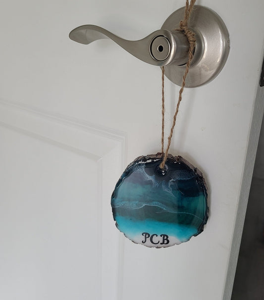 I created this ornament on a slice of wood with Resin. It doesn't have to go on a tree. It can hang on a door, wall or over your favorite bottle of wine! The PCB has a coat of resin over it so that it will not come off. I can do other cities or names on one for you, but no two will come out alike! I also have them with silver and blue letters. Send me a message if you are interested. They range in size from 3 to 4 inches diameter. Wine bottle is NOT included.