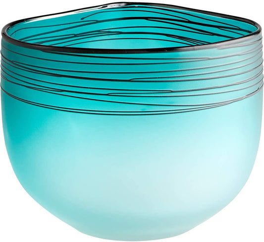 Striking glass vase by Cyan Design.  Turquoise color fades to white with thin black lines drizzled around the top band. 8.75 x 7.25 inches.  Weight: 6.7 lbs.