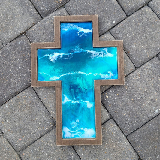 Beautiful Ocean of Blue and Turquoise Waters with White Waves makes you want to dive right in. Resin on Wood Hand Crafted at my home in Florida One of a kind artwork for your wall Wood MDF Cross with Saw tooth hanger on the back Approximate size: 14.25 x 10 inches