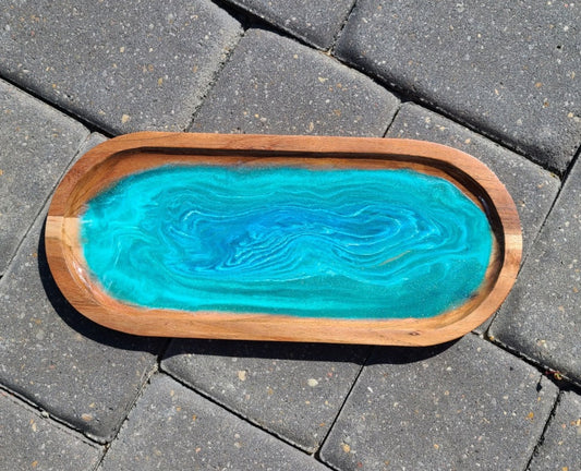 14 x 6 inch oblong wood tray.  I embellished this tray with hues of blue and blue green.  Design looks like lines of color that go deeper and deeper.