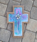 Sparkling colors of Purple, magenta, teal and pearl in this beautiful cross.  Resin  In the Center, I placed abalone shells and a peacock pearl  Wood MDF cross with saw tooth hanger on the back  Approximate size: 14.25 x 10 inches