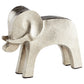6 inch tall elephant.  Rounded edges, head and trunk. Made of metal.  Brushed Silver tone. Protective pads on feet to protect furniture. Weighs over 1 pound.